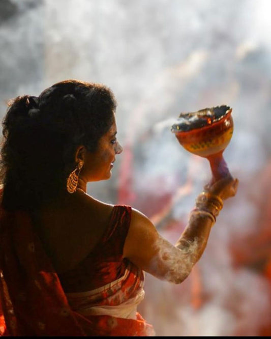 Bengali women wearing bindhani gold plated dangler earrings during dance