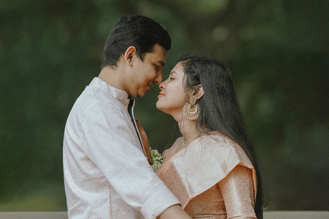 Indian-beautiful-couple-post-Wedding-photo--women-wear-pastel-pink-meenakari-chandbali-earrings-silk-saree-photo-by-maksudur-rahman