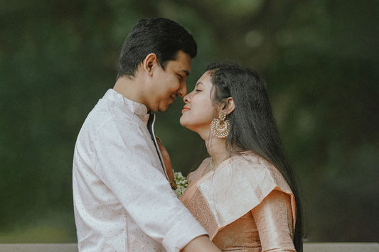 Indian-beautiful-couple-post-Wedding-photo--women-wear-pastel-pink-meenakari-chandbali-earrings-silk-saree-photo-by-maksudur-rahman