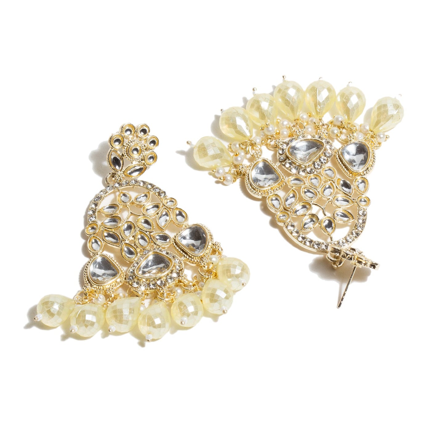 Back view of gold-tone chandelier earrings with secure post backing, featuring intricate kundan stone detailing and dangling white pearl drop accents.