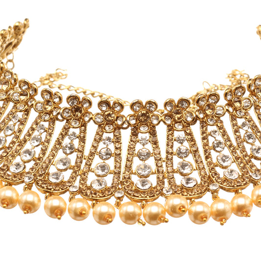 Front view of Bindhani gold-plated choker necklace featuring golden and white stones, fan-shaped motifs, floral accents, intricate openwork detailing, and pearl bead drops along the lower edge. Displayed on a white background.