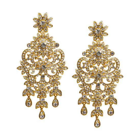 Bindhani gold-plated statement earrings featuring clear stones with sparkling crystal accents. Each earring showcases a floral stud, intricate openwork filigree design with floral and scrollwork detailing, a central stone motif, and three dangling teardrop-shaped clear stone drops. Front view displayed on a white background.