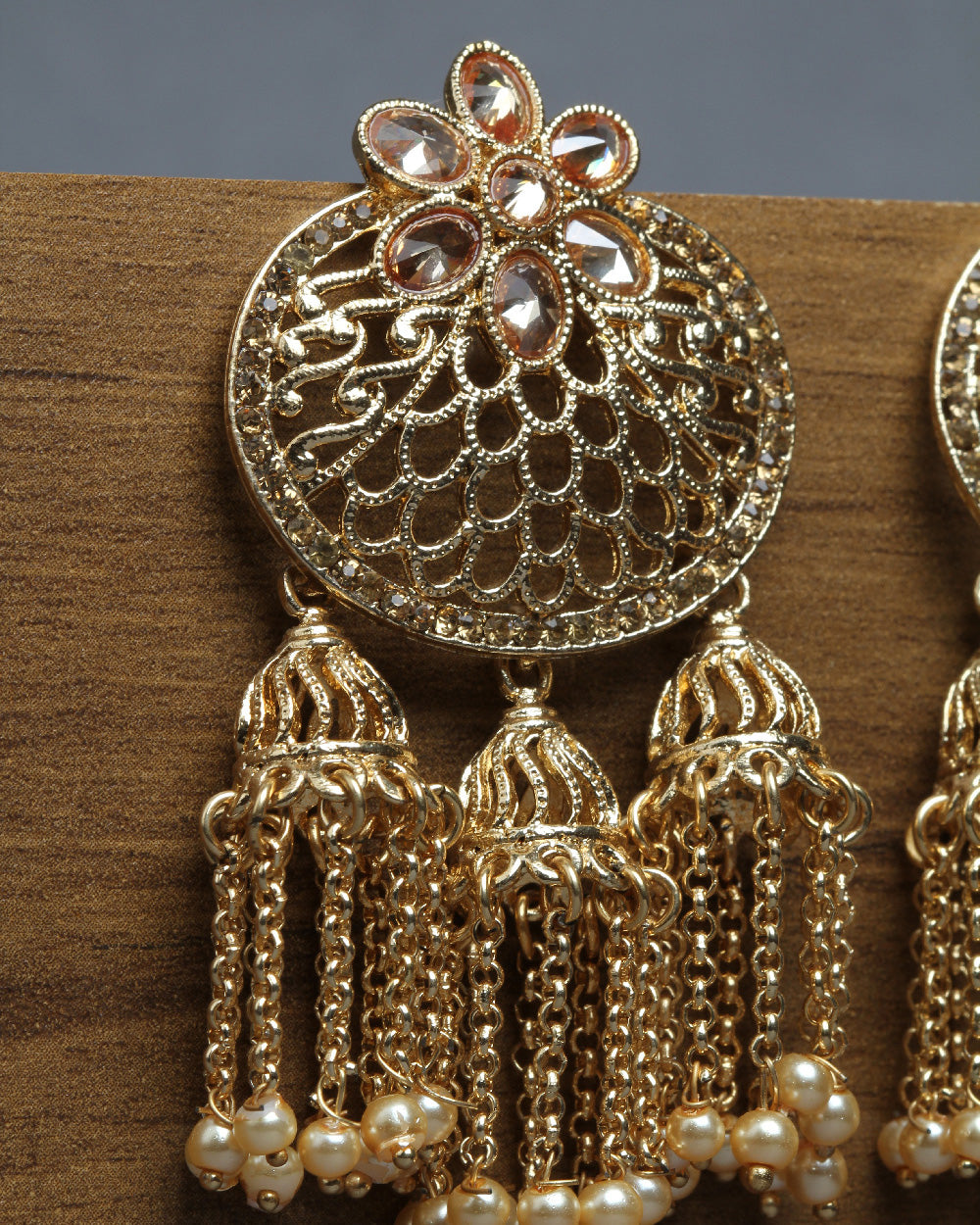 Bindhani gold plated drop pearls Golden stone Jhumka earrings secured with post back closure for women and girls