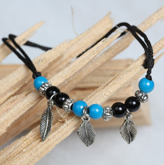 Black thread charms anklets and what they denote