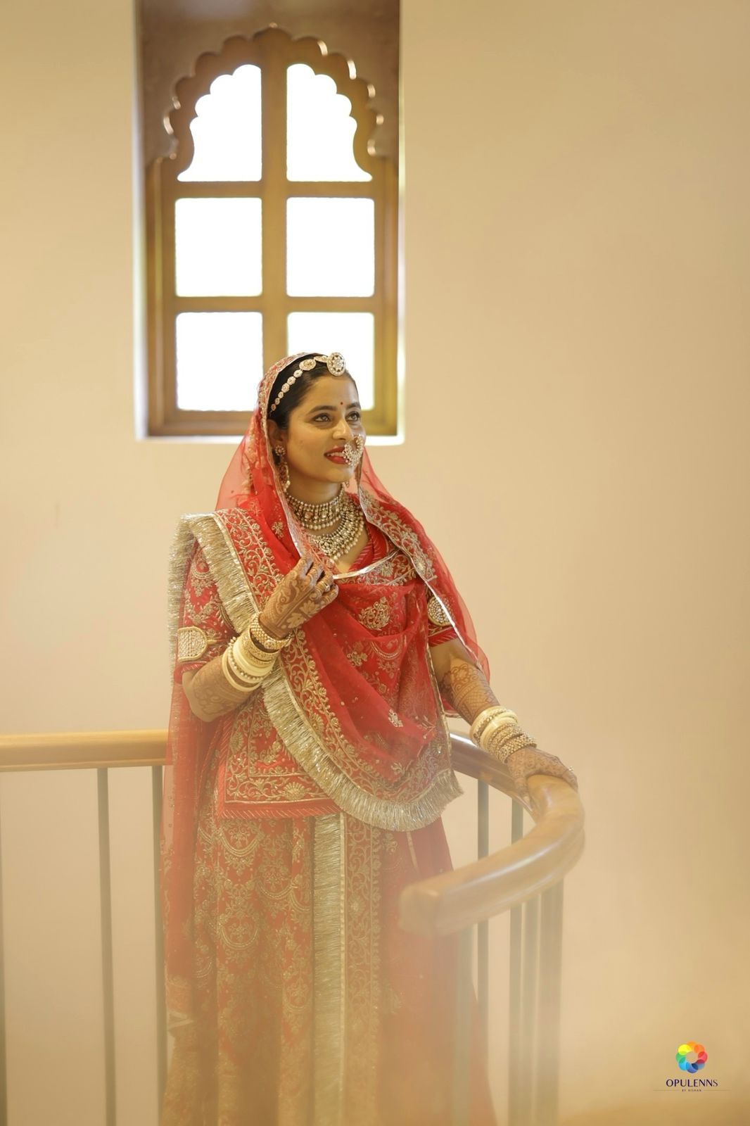 Honeyy Jainn wearing Bindhani bridal head jewelary