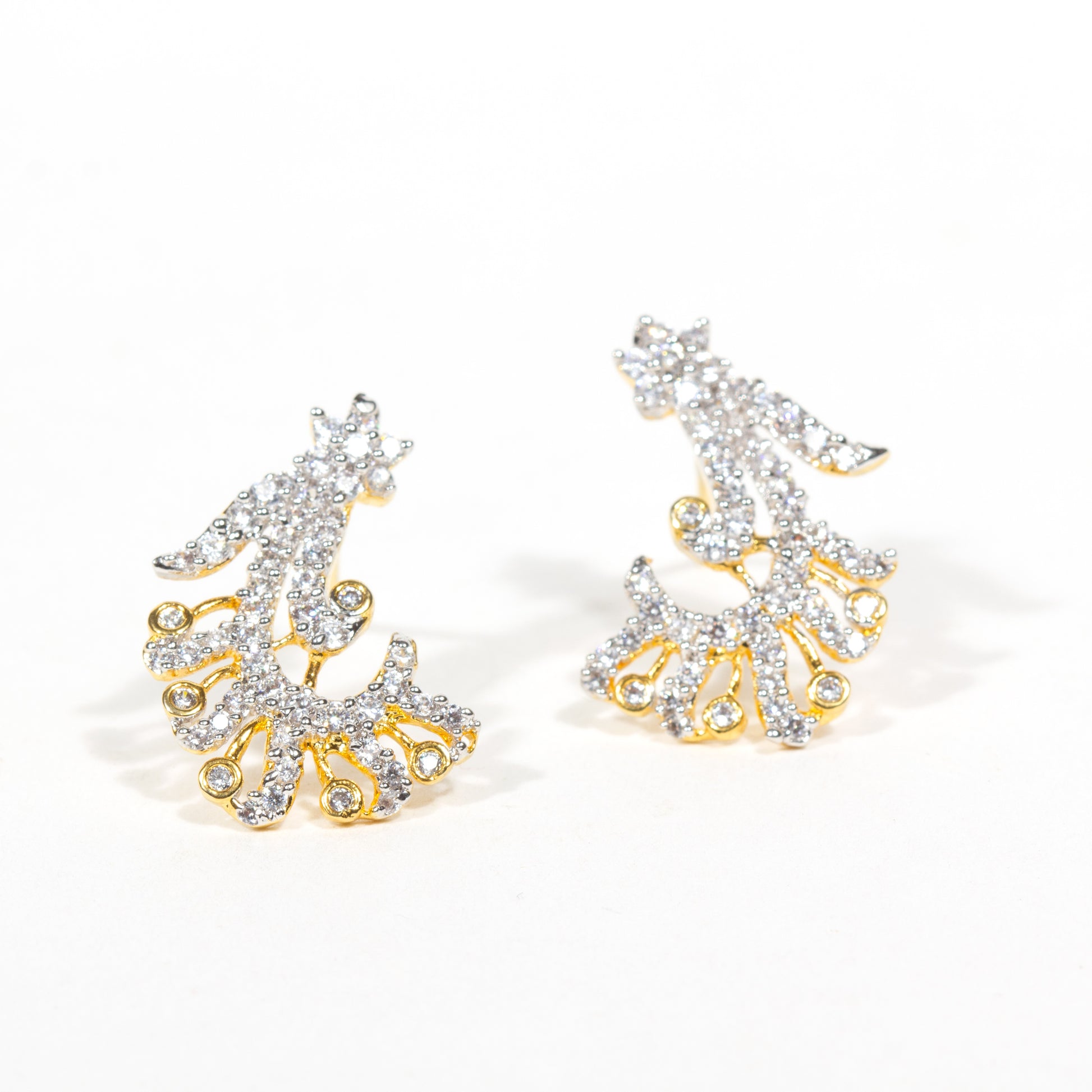 Elegant Bindhani gold-plated stud earrings featuring an intricate flower-shaped design adorned with shimmering faux white American diamond and cubic zirconia stones for a classic traditional look.