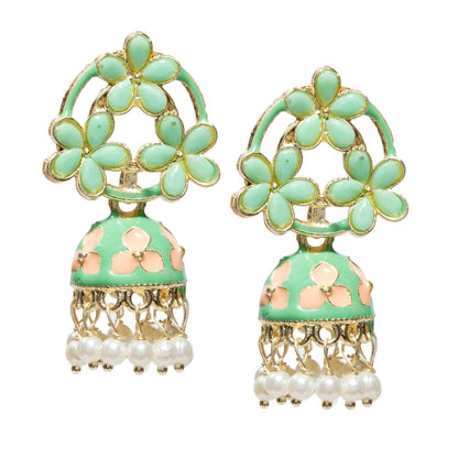 Pair of gold-tone floral jhumka earrings featuring mint-green petal-shaped stones in an open floral pattern, accented with mint-green enamel detailing and cream flower motifs on the dome. Finished with intricate gold filigree work and dangling white pearl beads for a traditional festive look.”