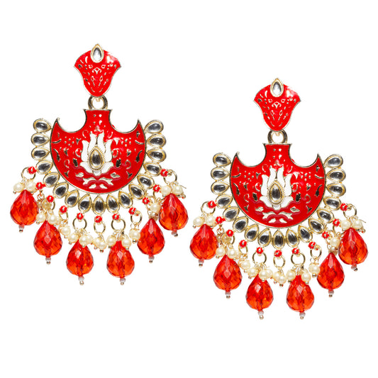 Bindhani gold-plated red crescent meenakari earrings with teardrop kundan stones, lotus floral centerpiece, pearl cluster hangings, and red faceted teardrop bead danglers.