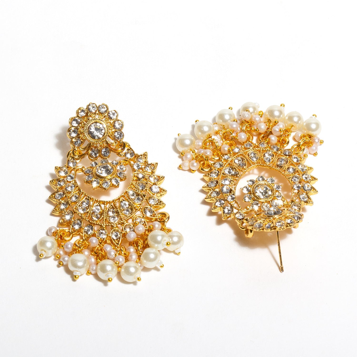 Back view of Bindhani gold-plated traditional Indian earrings, showing earring posts and secure backing, with intricate design and white stones visible from the front.