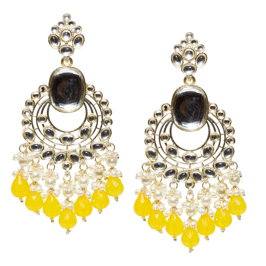 Bindhani gold-plated long chandelier earrings featuring clear Kundan stones, an oval white center stone, pearl clusters, and yellow faceted teardrop bead danglers in a traditional ethnic design.