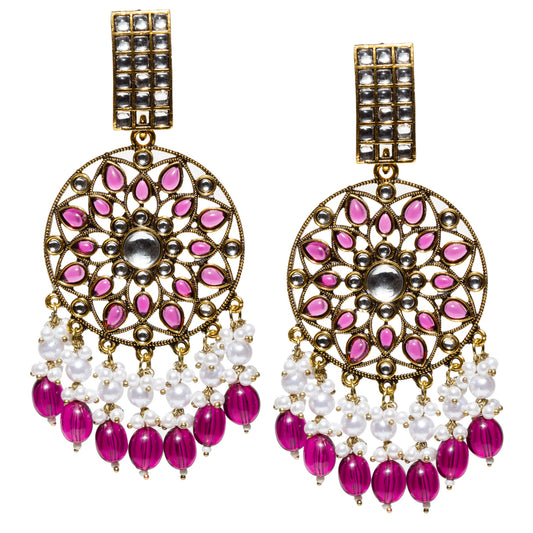 Bindhani mehandi antique gold plated purple wine drops kundan stone earrings featuring a rectangular Kundan stone stud, intricate antique gold-tone circular floral filigree design with purple wine teardrop stones, central kundan stone, crystal accents, and dangling white pearl clusters with vibrant purple wine bead drops. Elegant ethnic statement earrings displayed as a pair on a white background.