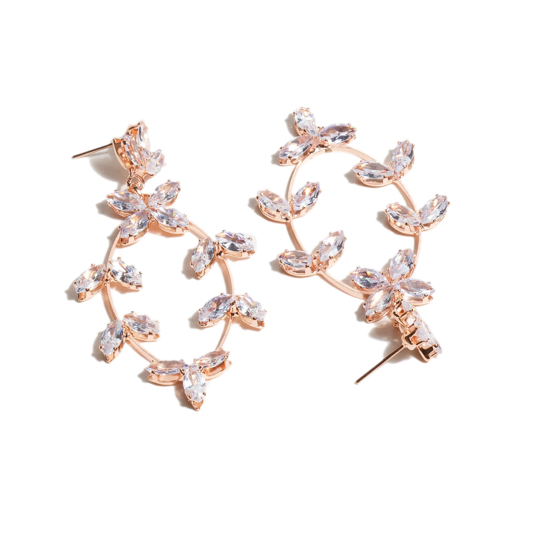 white background back view Pair of rose gold-tone oval earrings secure post backing adorned with golden AD stones in marquise cuts, arranged in floral clusters with an elegant open dangle earrings design for women. secure post