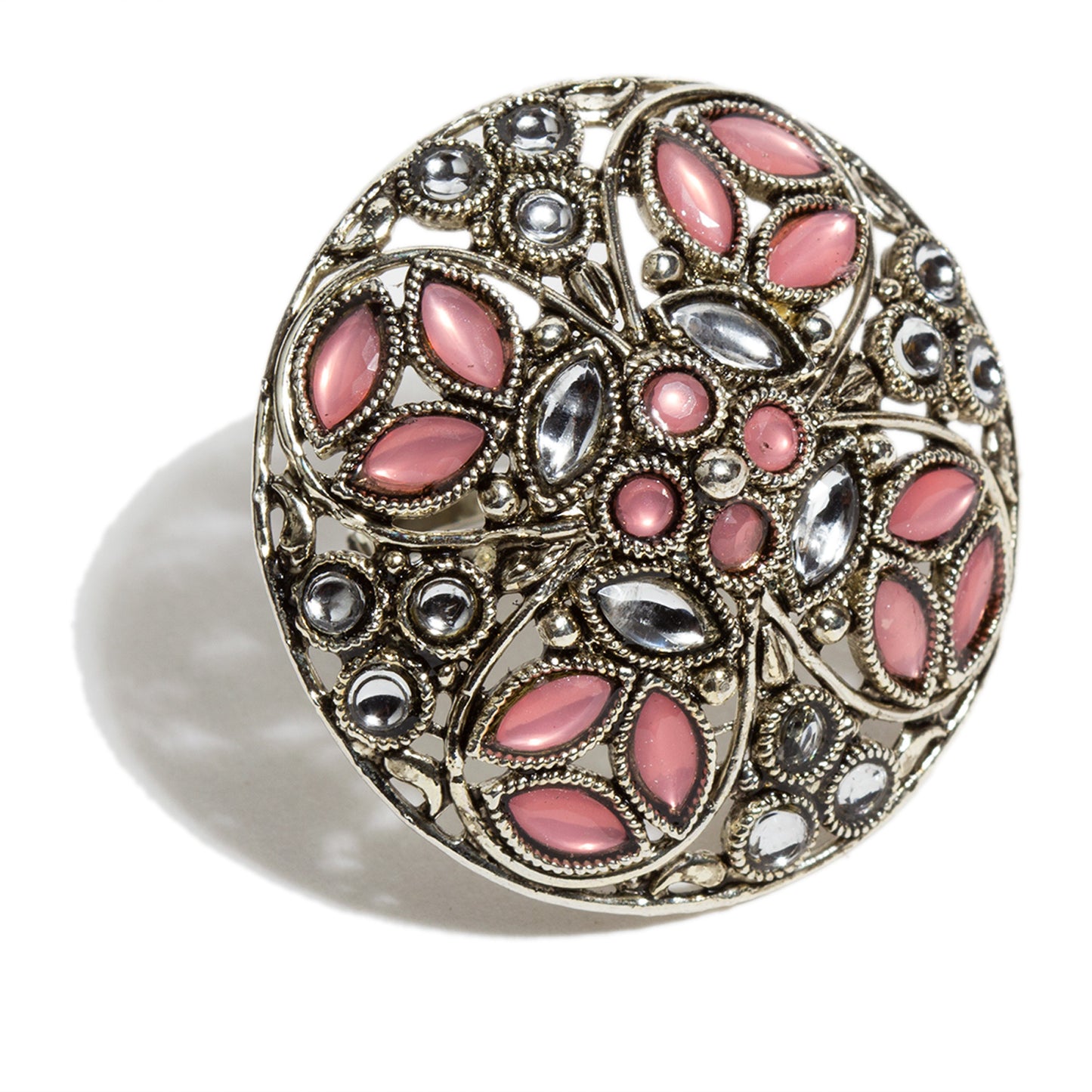 Bindhani silver oxidised adjustable finger ring featuring an intricate circular floral design with pink and clear kundan-style stones arranged in petal and cluster patterns. The detailed antique-style filigree metalwork creates a traditional ethnic look suitable for women and girls.