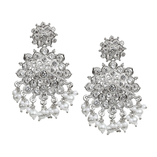 Bindhani silver-plated traditional earrings for women, featuring white stones and a dangling pearl drop in an intricate design.