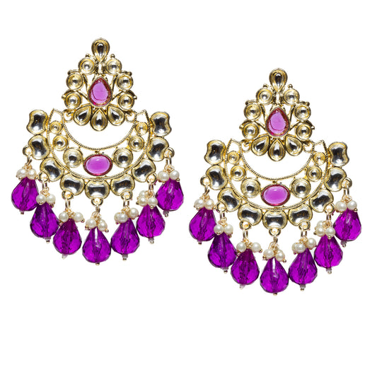 Bindhani gold-plated Kundan chandbali earrings featuring a teardrop-shaped purple stone at the top, surrounded by white Kundan stones and intricate crescent detailing. The design is accented with an oval purple stone at the center and finished with faceted purple bead drops and delicate white pearl clusters. Traditional statement earrings displayed as a pair on a white background.