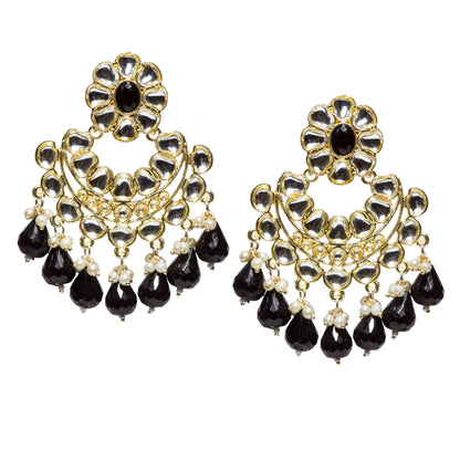 Bindhani gold-plated Kundan Chandbali earrings featuring floral black stone tops, intricate white Kundan stone detailing, circular crescent-shaped design, gold-tone handcrafted work, pearl bead accents, and bright black teardrop stone danglers. Traditional Indian statement earrings for women on a white background.