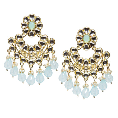 Bindhani gold-plated Kundan Chandbali earrings featuring floral turquoise stone tops, intricate white Kundan stone detailing, circular crescent-shaped design, gold-tone handcrafted work, pearl bead accents, and bright turquoise teardrop stone danglers. Traditional Indian statement earrings for women on a white background.