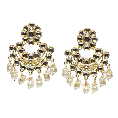 Bindhani gold-plated Kundan Chandbali earrings featuring floral white kundan stone tops, intricate white Kundan stone detailing, circular crescent-shaped design, gold-tone handcrafted work, pearl bead accents, and bright round white drop stone danglers. Traditional Indian statement earrings for women on a white background.