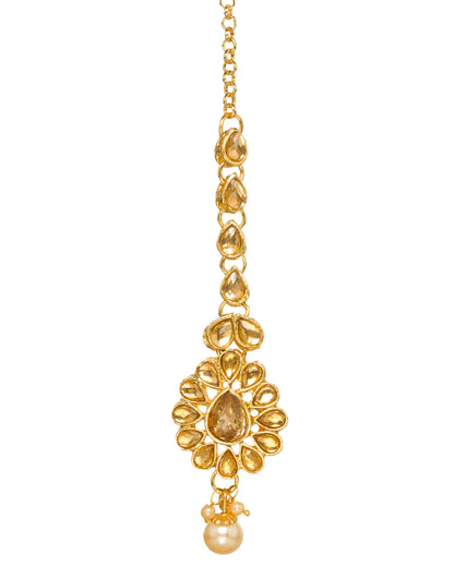 Bindhani gold-plated Kundan stone maang tikka for women featuring a floral design with white Kundan stones, intricate gold detailing, and a pearl drop accent on a white background