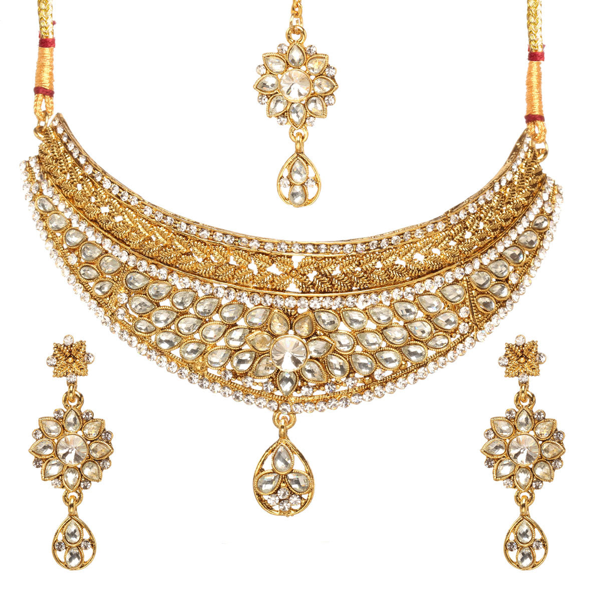 Bindhani gold-plated bridal choker necklace set featuring intricate gold filigree work, multiple layers of white stone embellishments, floral motifs, and a central teardrop pendant. The set includes matching floral drop earrings and a coordinating maang tikka with white stones and teardrop hanging details. Traditional wedding jewelry set displayed on a white background.