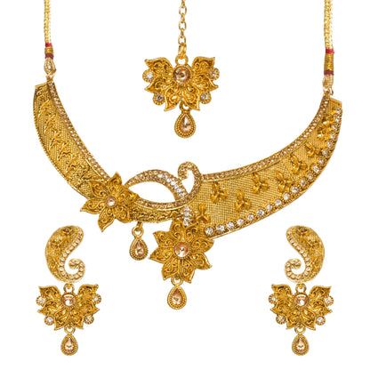 Bindhani gold-plated floral choker necklace set featuring intricate filigree detailing, crystal accents, and floral motifs with teardrop danglers. The set includes matching floral drop earrings with paisley-shaped tops and a coordinating maang tikka, displayed on a white background.