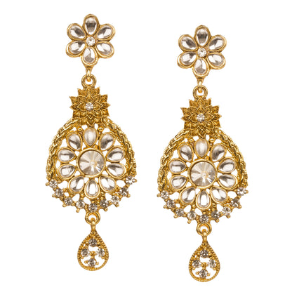 Bindhani gold-plated floral drop earrings featuring white Kundan stones, flower-shaped motifs, intricate filigree detailing, crystal accents, and a teardrop-shaped dangling charm. Displayed on a white background.