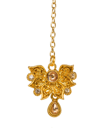 Bindhani gold-plated floral maang tikka featuring intricate filigree detailing, crystal accents, and a teardrop-shaped crystal dangler, displayed on a white background.