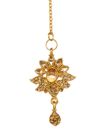 Bindhani gold-plated floral maang tikka for women featuring an intricate flower design, sparkling stone embellishments, elegant gold detailing, and a hanging teardrop charm on a white background.