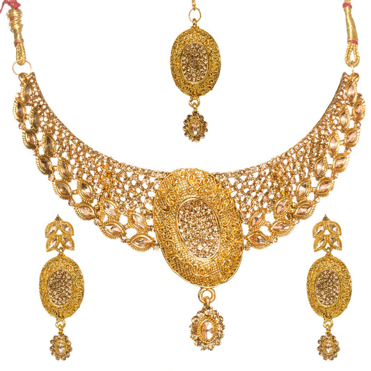 Bindhani gold-plated necklace set for women featuring an intricate traditional choker design with oval-shaped pendant, detailed filigree work, sparkling stone embellishments, matching earrings, and maang tikka with elegant gold craftsmanship on a white background.