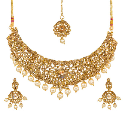 Bindhani gold-plated necklace featuring intricate traditional design with elegant pearl drop accents, detailed gold craftsmanship,matching floral pearls drop earrings, and a checker  design on a white background.