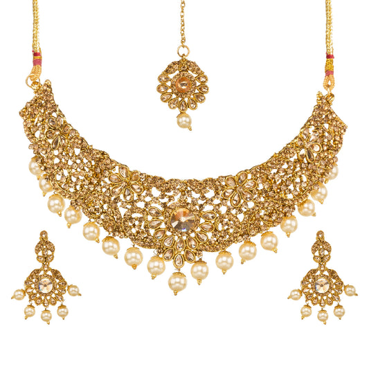 Bindhani gold-plated necklace featuring intricate traditional design with elegant pearl drop accents, detailed gold craftsmanship,matching floral pearls drop earrings, and a checker  design on a white background.