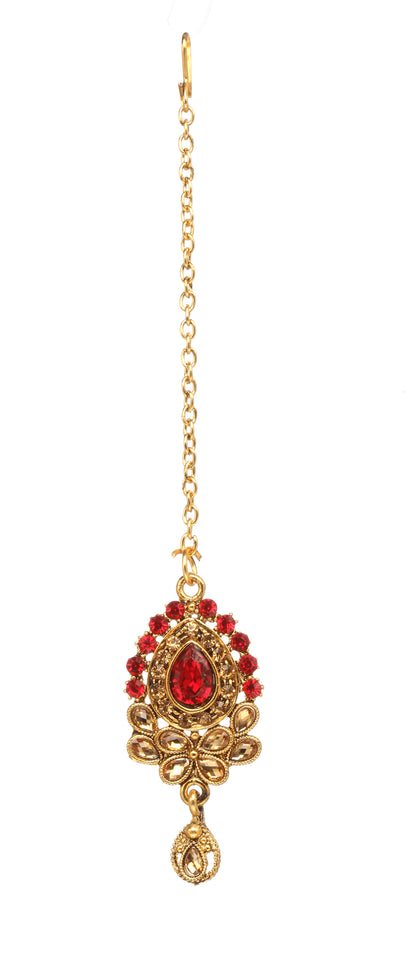 Bindhani gold-plated maang tikka featuring a pear-shaped red stone, red and golden stone embellishments, floral detailing, and a teardrop-shaped dangling charm. Displayed on a white background.
