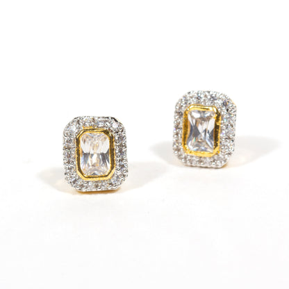 Bindhani gold-plated stud earrings with rectangular American diamond stones, surrounded by small clear stones in a halo design.