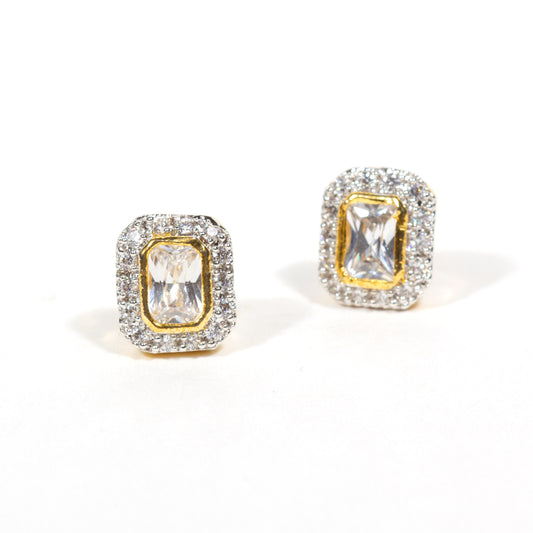 Bindhani gold-plated stud earrings with rectangular American diamond stones, surrounded by small clear stones in a halo design.