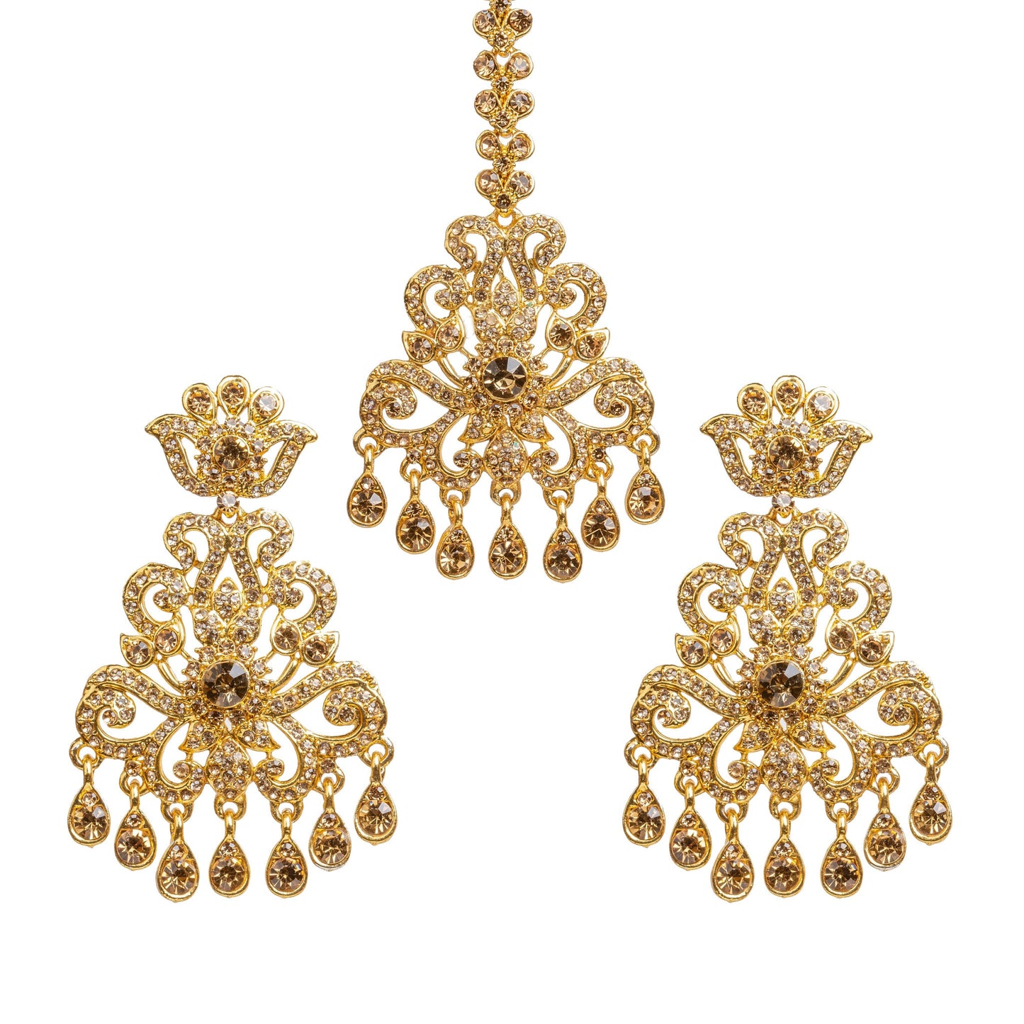 Bindhani gold plated LCT stone maang tikka and matching earrings set featuring an intricate floral and scrollwork design with sparkling white LCT stones. The statement earrings have a crown-inspired stud, ornate openwork pattern, a large round center stone, and seven teardrop-shaped dangling stone drops. The matching maang tikka features a decorative stone chain with an S hook, ornate centerpiece, and seven dangling stone drops. Traditional Indian bridal jewelry set displayed on a white background.