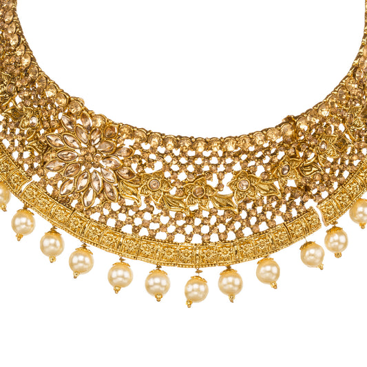 Bindhani gold-plated choker necklace set for women featuring intricate traditional design, elegant stone embellishments, detailed gold craftsmanship, a stylish bridal jewelry look on a white background."