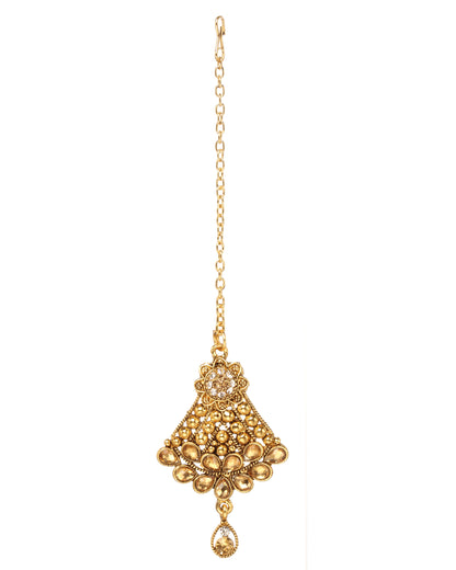 Bindhani golden-plated maang tikka featuring a floral top, intricate filigree lattice detailing, champagne stones, crystal embellishments, and a teardrop-shaped dangling charm. Displayed on a white background.
