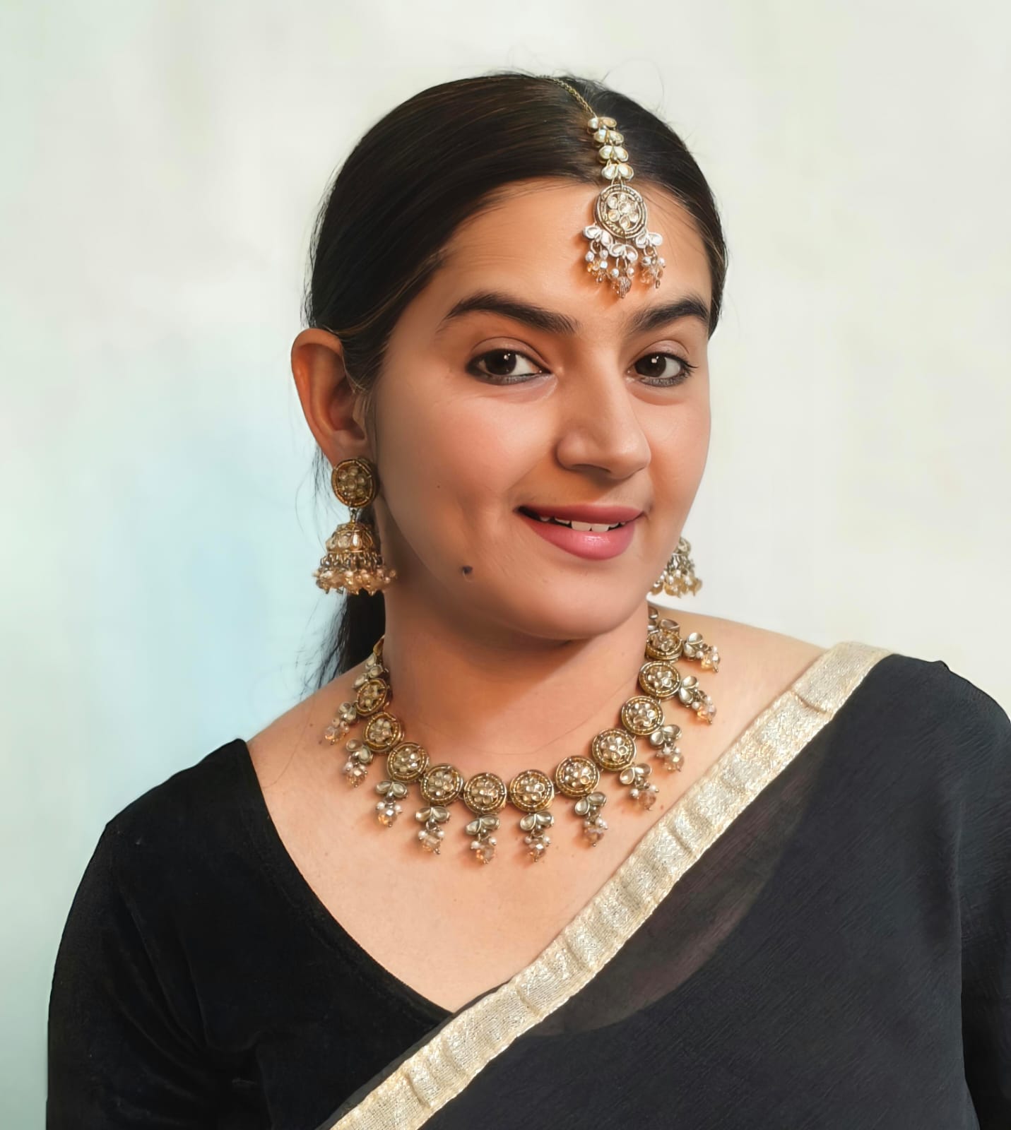 Model wearing Bindhani mehndi-plated LCT stone choker set – elegant Indian jewelry styled for festive and bridal look