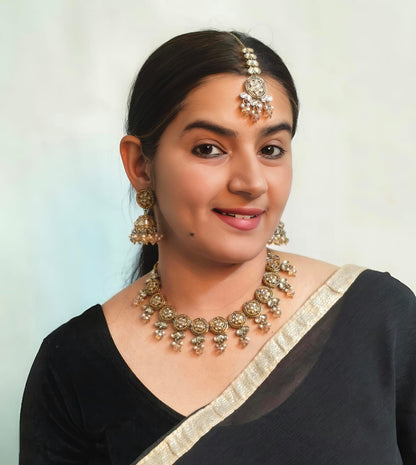Model wearing Bindhani mehndi-plated LCT stone choker set – elegant Indian jewelry styled for festive and bridal look