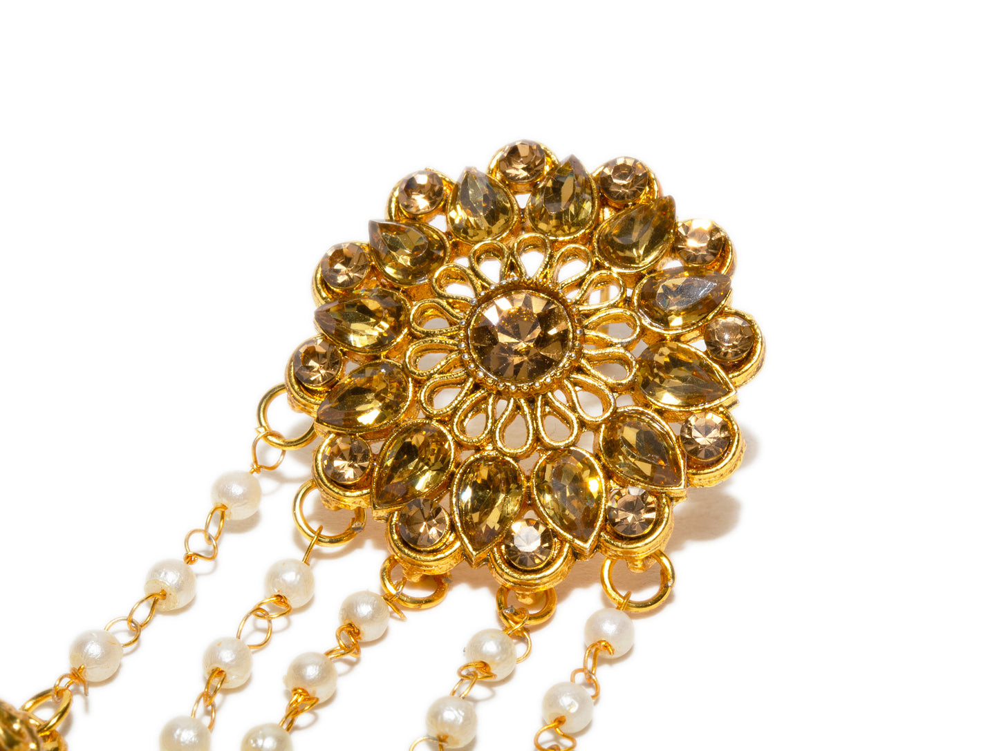 Gold floral headpiece with pearl strands on a white background