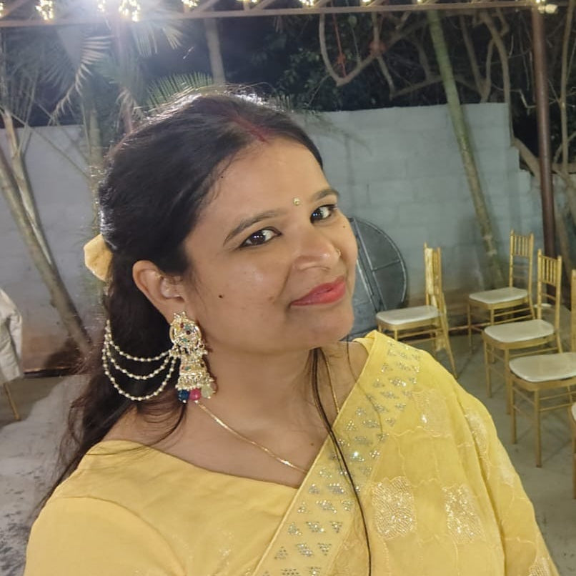 Sunitha wearing Bindhani bird jhumka with pearl string.