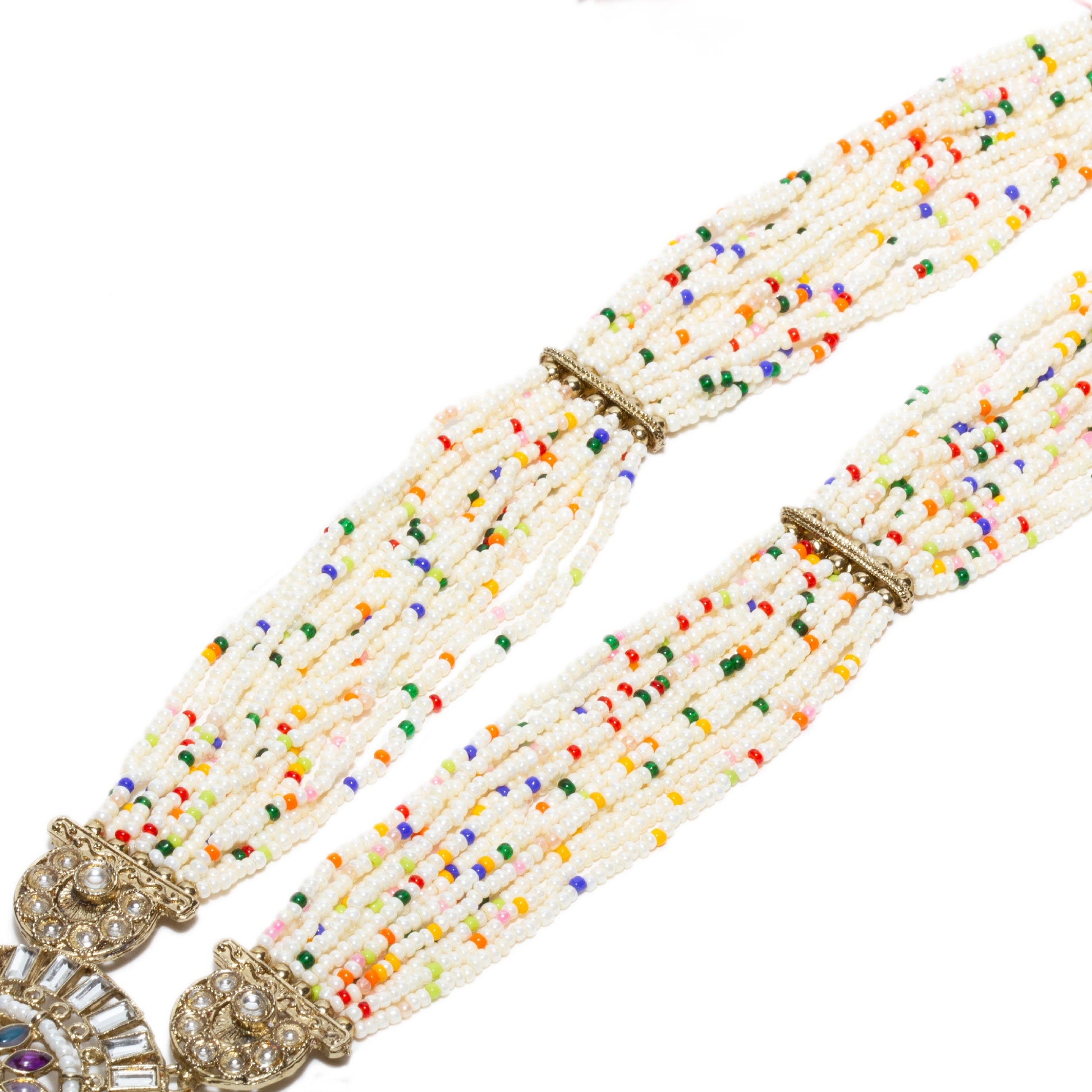Long-length rani haar necklace displayed flat, showing multiple strands of white seed beads with scattered multicolor beads. The necklace features a large circular kundan-style pendant with colorful stones and dangling pastel teardrop beads in pink, yellow, mint green, and sky blue. The full length of the necklace is visible, including antique gold-tone bead connectors and a red-and-green thread tassel closure.