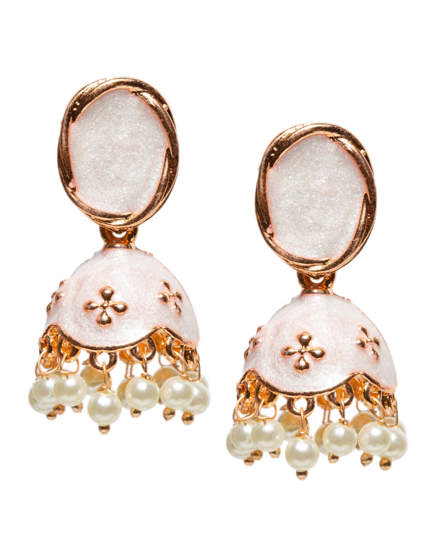 Bindhani rose gold-tone jhumka earrings featuring oval stud tops with white meenakari enamel work. The earrings have dome-shaped drops adorned with embossed motifs and dangling white pearl beads, creating a graceful traditional ethnic look.