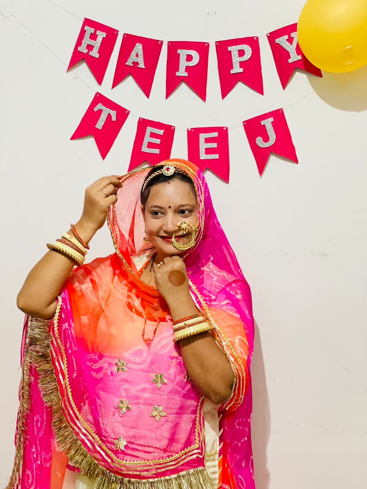 rinku rajpurohit celebrating her teej in bindhani nath nose ring jewellery