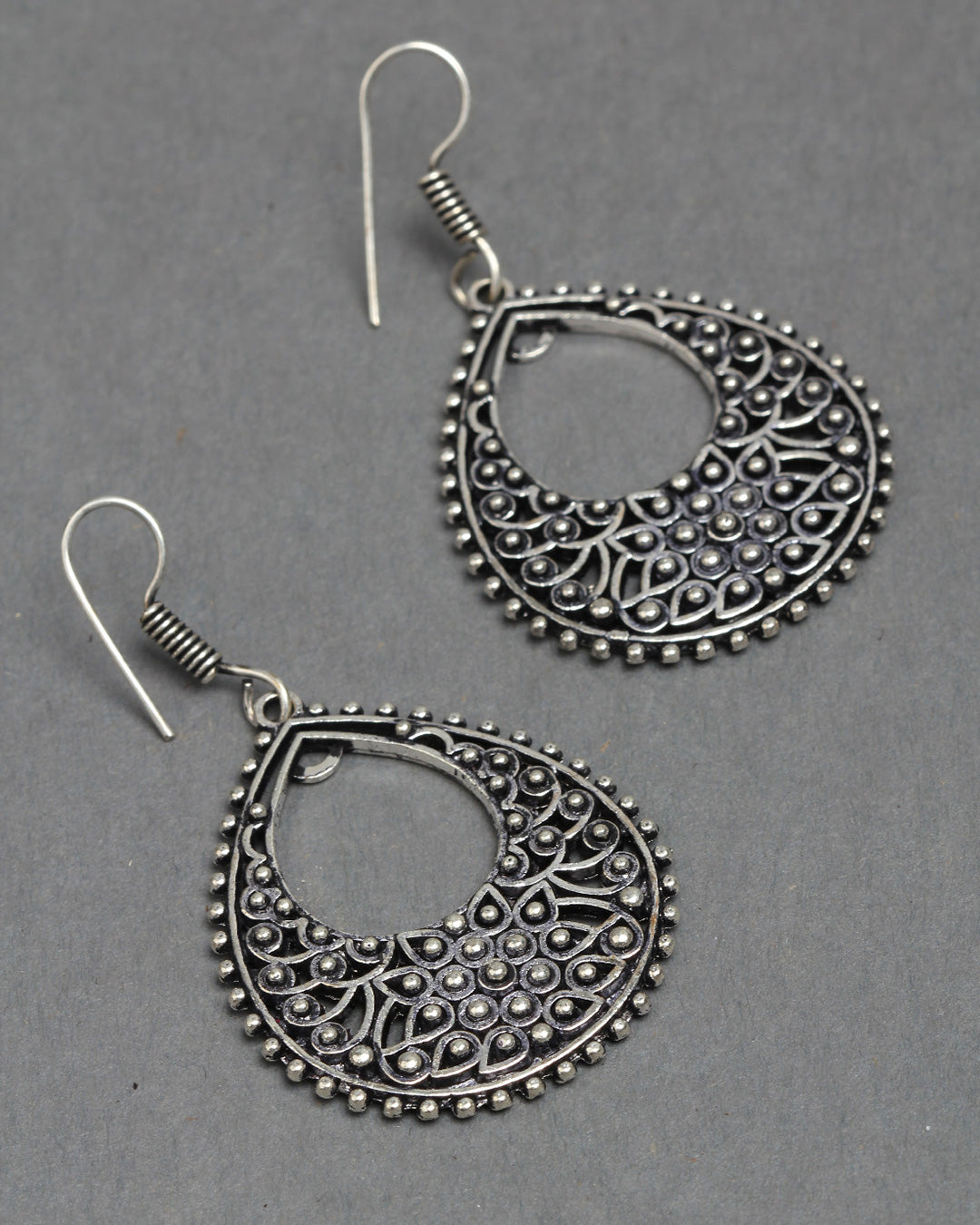 Bindhani silver toned black oxidized tear leaf shape earrings secured with fish hook earwire for women and girls