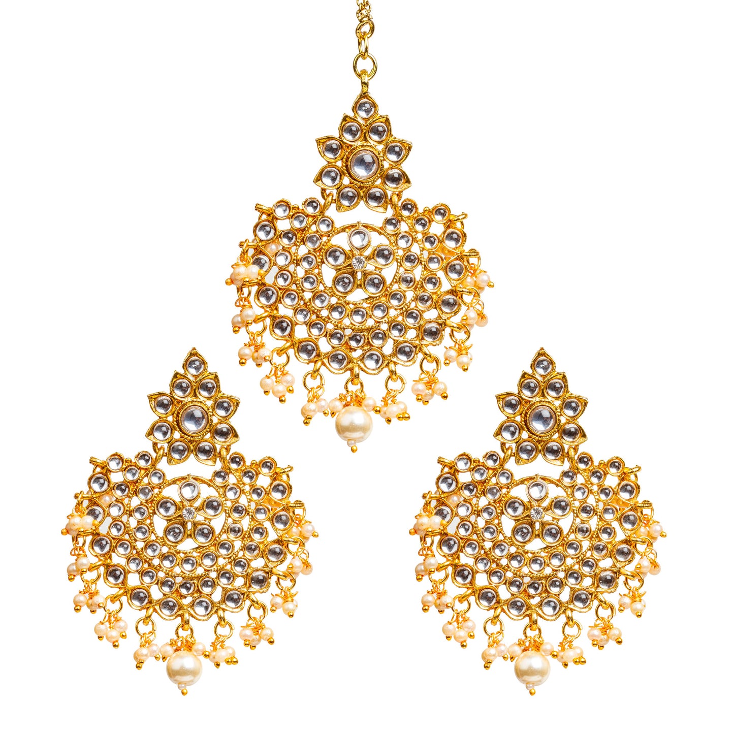 Bindhani gold-plated Kundan earrings and maang tikka set featuring clear Kundan stones with white pearl drop detailing. The earrings showcase a floral Kundan stone-studded top, an intricate circular openwork design with petal-shaped and round Kundan stones, and delicate white pearl hanging drops with a larger center pearl. The matching maang tikka features a coordinating floral top, circular Kundan design, and white pearl drop embellishments with a larger center pearl. Front view