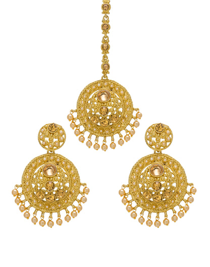 Bindhani gold-plated earrings and maang tikka set featuring intricate circular filigree detailing with champagne-colored stones and pearl drop accents. The earrings showcase a round stud, ornate openwork circular design with three champagne-colored center stones, and multiple small pearl hanging drops along the lower edge. The matching maang tikka features a coordinating circular filigree design with champagne-colored center stones and pearl drop embellishments. Front view displayed on a white background.