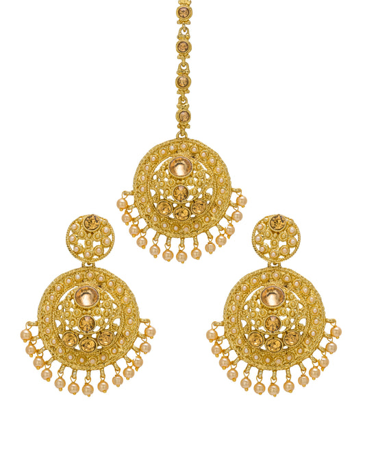 Bindhani gold-plated earrings and maang tikka set featuring intricate circular filigree detailing with champagne-colored stones and pearl drop accents. The earrings showcase a round stud, ornate openwork circular design with three champagne-colored center stones, and multiple small pearl hanging drops along the lower edge. The matching maang tikka features a coordinating circular filigree design with champagne-colored center stones and pearl drop embellishments. Front view displayed on a white background.