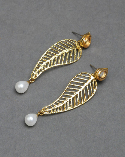Bindhani gold-plated kundan stud earrings featuring a small teardrop-shaped stud adorned with white kundan stone detailing. The elegant stud top is connected to a leaf-inspired drop design with intricate openwork gold patterns and a white pearl hanging for a traditional and graceful look.