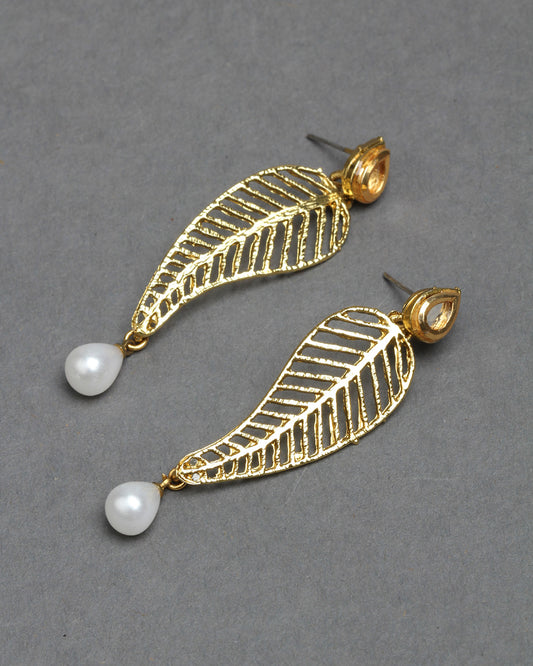 Bindhani gold-plated kundan stud earrings featuring a small teardrop-shaped stud adorned with white kundan stone detailing. The elegant stud top is connected to a leaf-inspired drop design with intricate openwork gold patterns and a white pearl hanging for a traditional and graceful look.